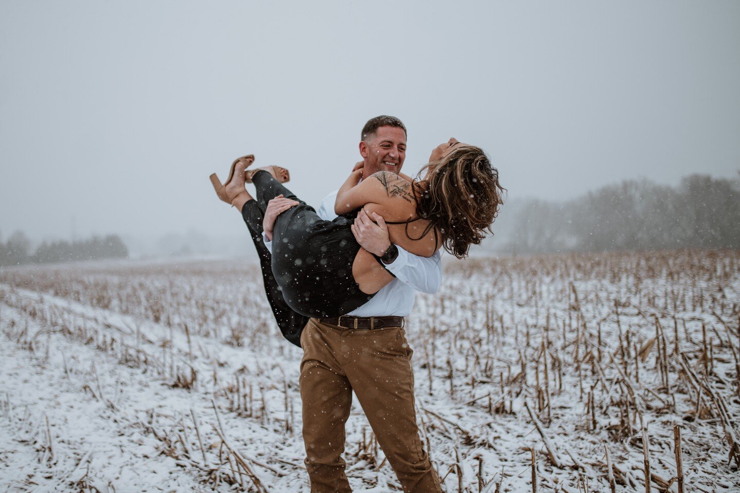 To the couples who embrace &quot;less than perfect&quot; weather&mdash;it's *so* freaking worth it.

Sneak peek from E + C's engagement session this evening. It was windy, snowy, and cold but OH MY LANTA the photos&mdash;I'm screamingggggg.